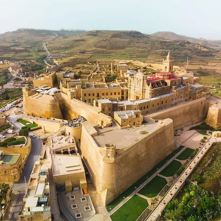 Dionisia Gozitan And Pool - Happy Ghammar